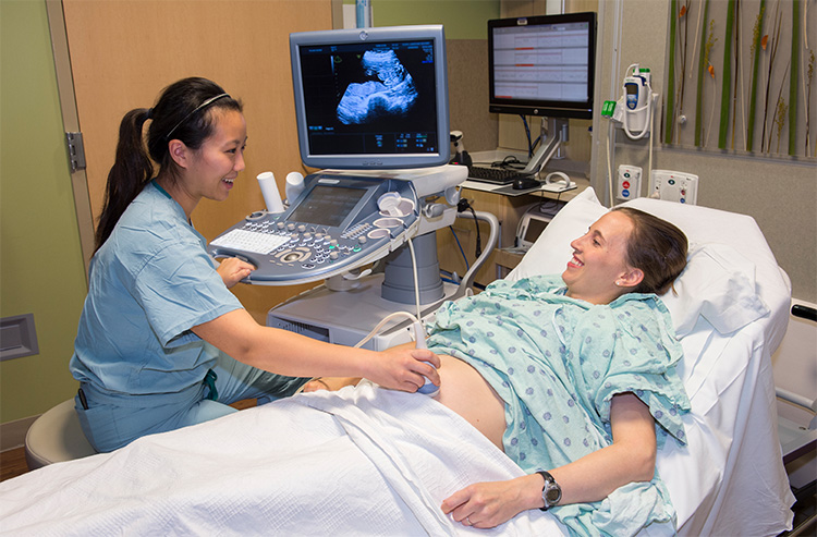 VCU Health provider with patient for an ultrasound.