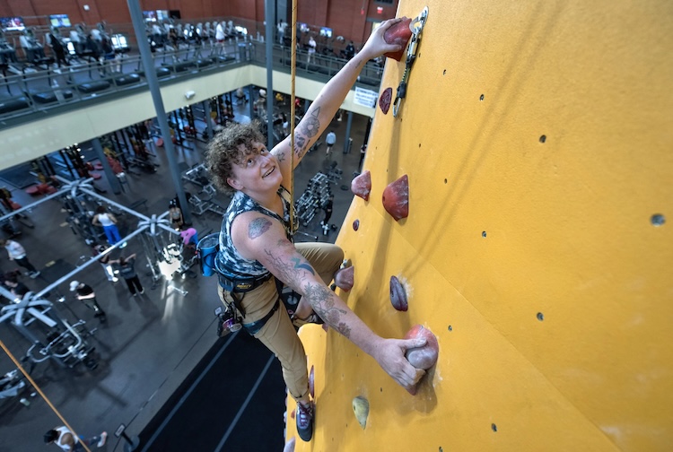 Person rock climbing in the gym