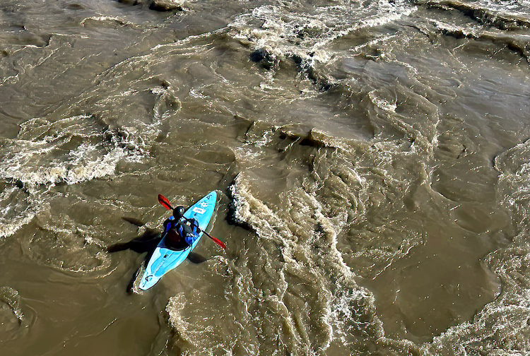 Man kayaking