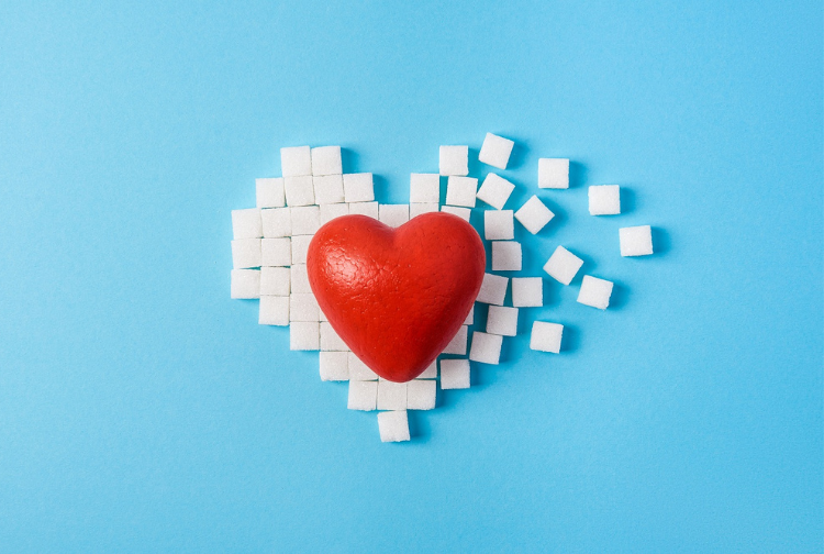 A heart displayed with sugar cubes representing diabetes