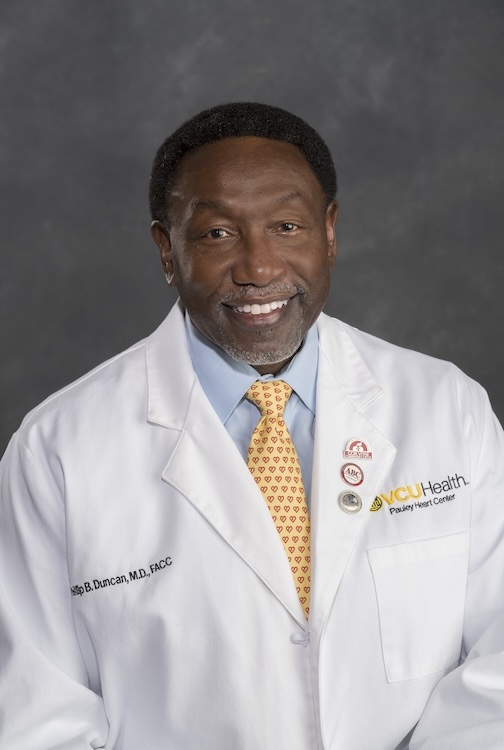 Phillip Duncan,MD, in hospital lab coat