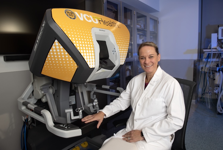 Dr. Czyszczon sits at the console of the da Vinci robotic surgery system