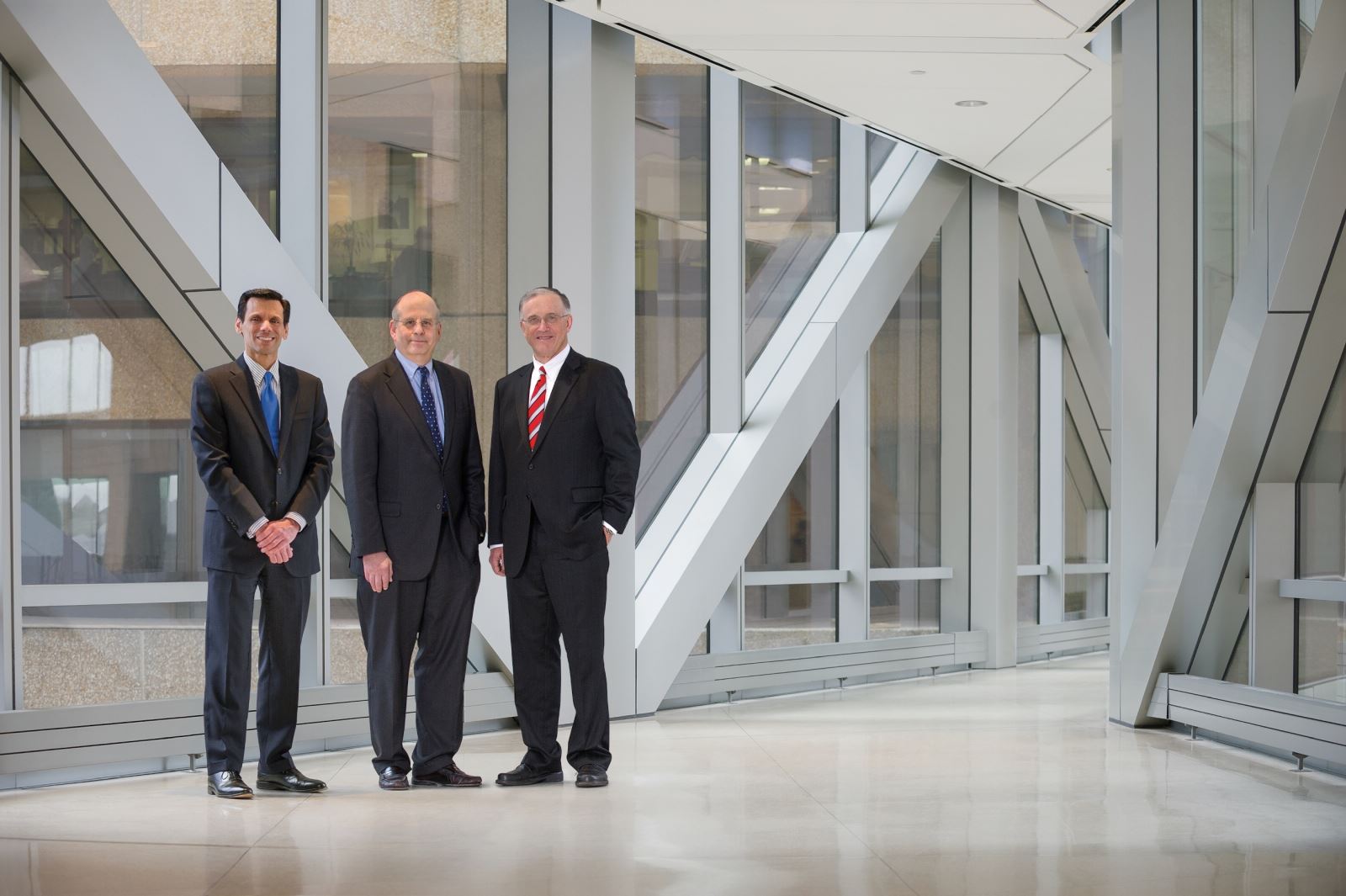 Jerry Strauss, M.D., Ph.D. with two other men